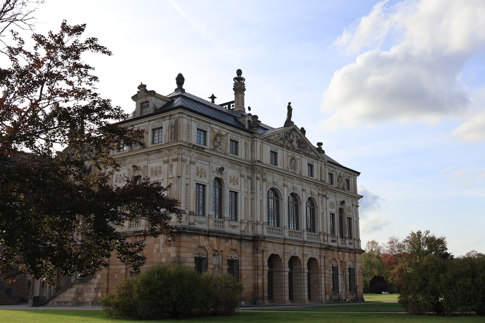 a large building with a clock on the top of it