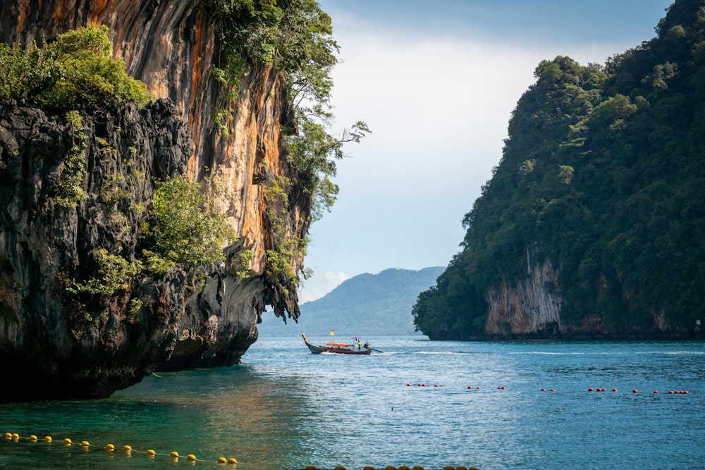 a boat is in the middle of a body of water