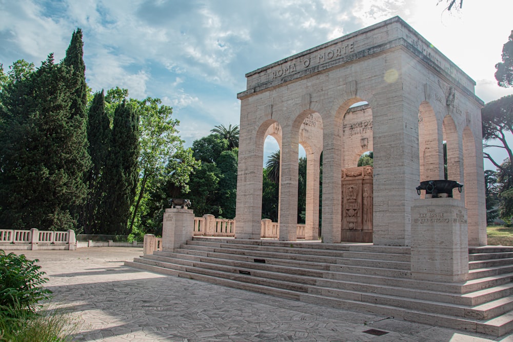 a stone monument with steps leading up to it