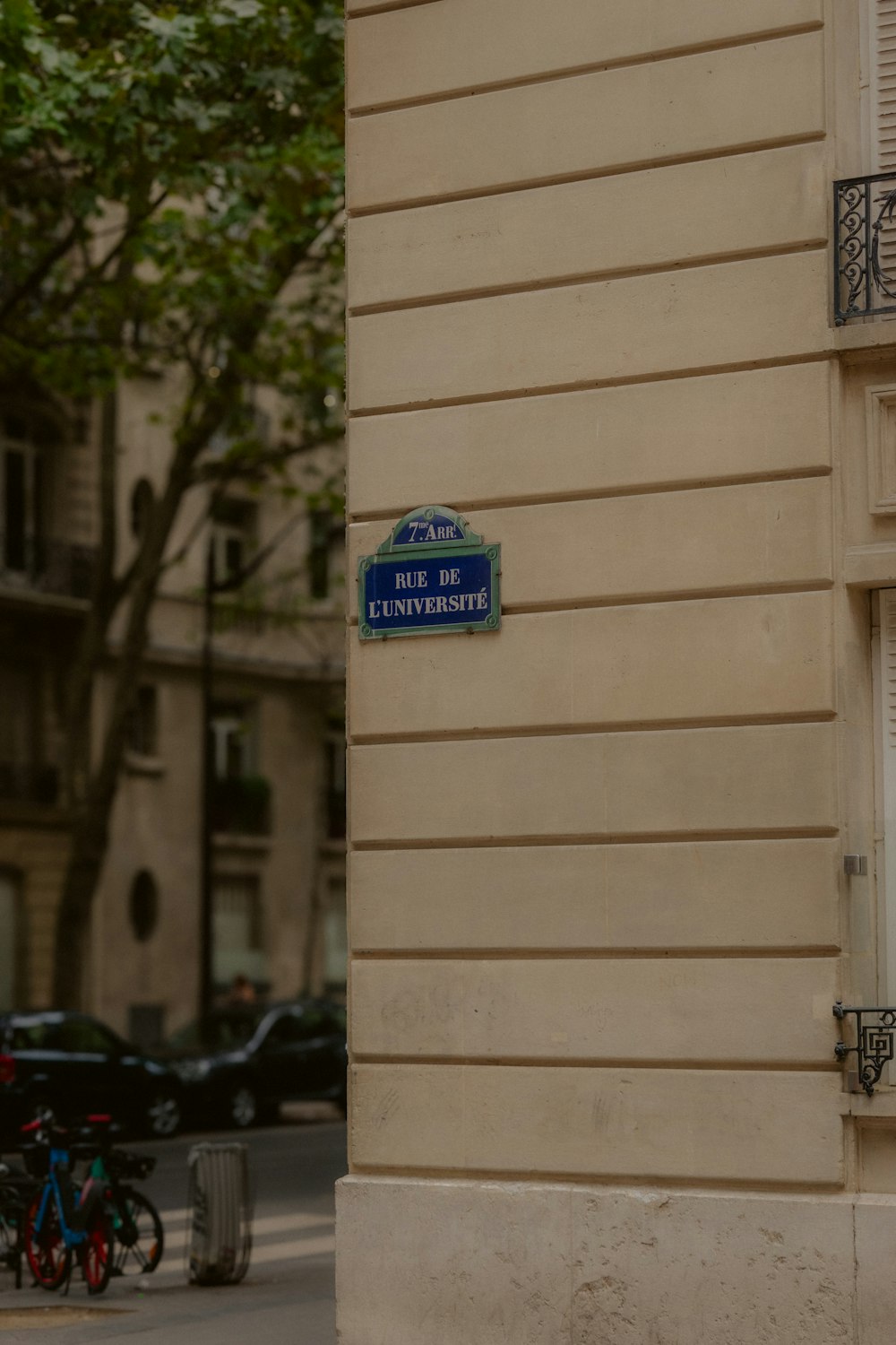 a street sign on the side of a building