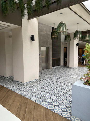 Cozy indoor space showcasing elegant porcelain tile flooring with warm natural light.