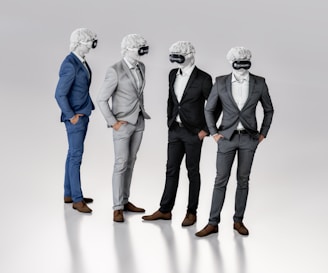 Four figures dressed in suits stand together, each wearing a virtual reality headset and featureless white masks resembling classical sculptures. They appear to be engaged in conversation or interaction, exhibiting a blend of classical and modern elements.