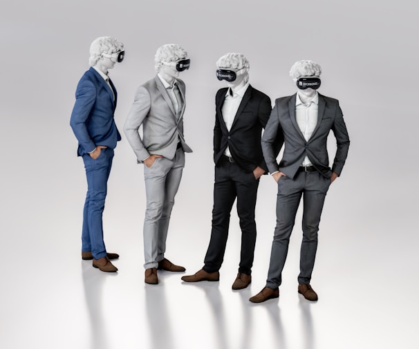 Four figures dressed in suits stand together, each wearing a virtual reality headset and featureless white masks resembling classical sculptures. They appear to be engaged in conversation or interaction, exhibiting a blend of classical and modern elements.