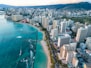 an aerial view of a Honolulu next to the ocean