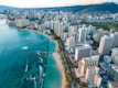 an aerial view of a Honolulu next to the ocean