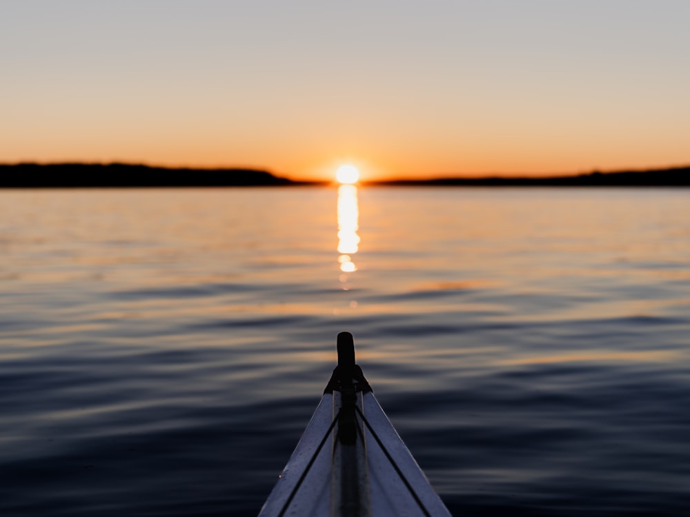 a view of the sun setting over a body of water