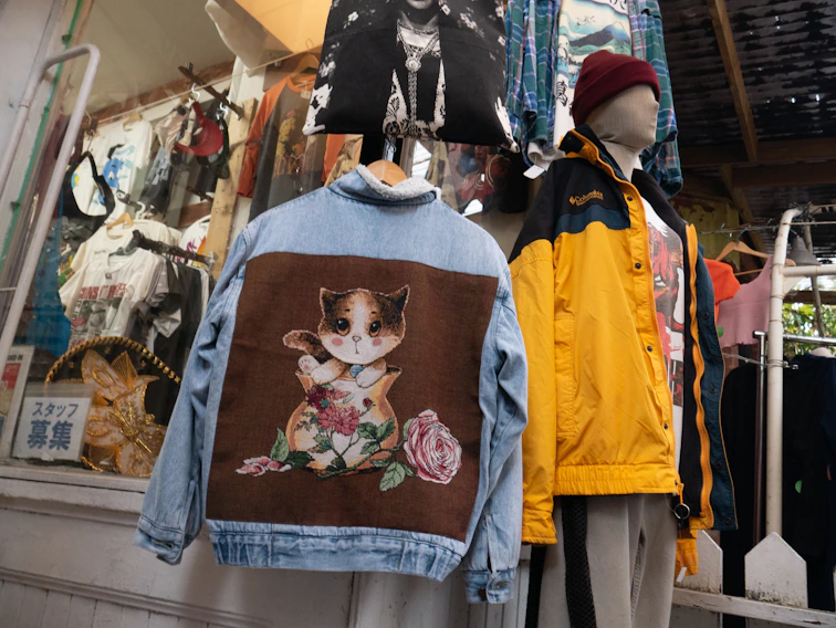 A vibrant display of Lucky Pull's latest One Piece-themed fashion collection featuring colorful tees and accessories.