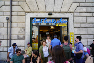 The iconic Bocca della Verità café exterior, a meeting place for our community.