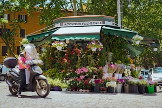 A vibrant flower stall attracting customers.