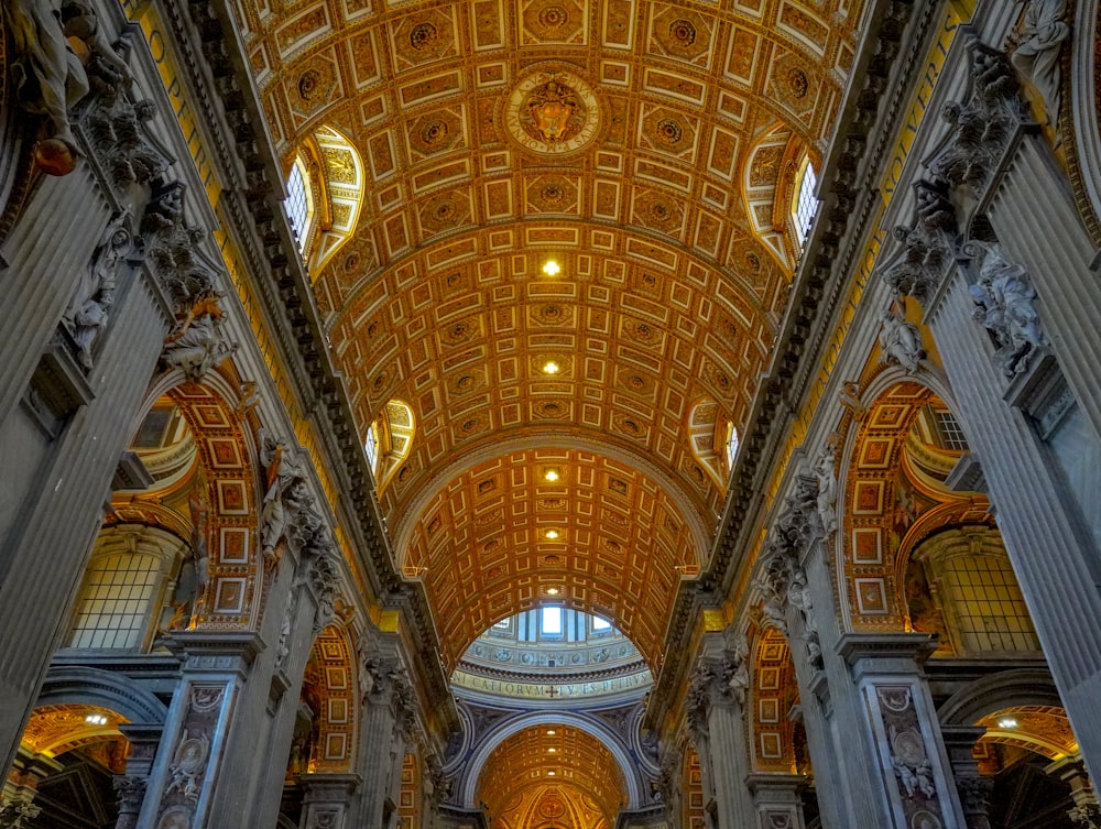 a large cathedral with a vaulted ceiling and columns