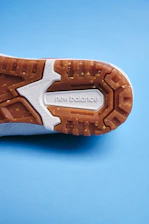 Robust TPEE outsole with tread pattern emphasizing durability and sustainability.