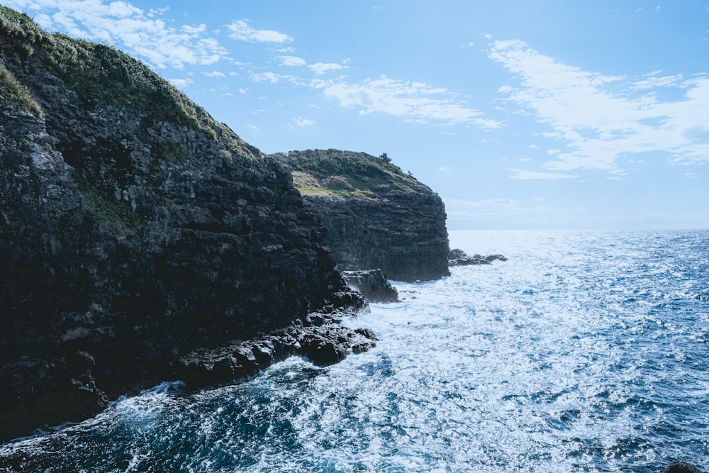 a view of the ocean from a cliff