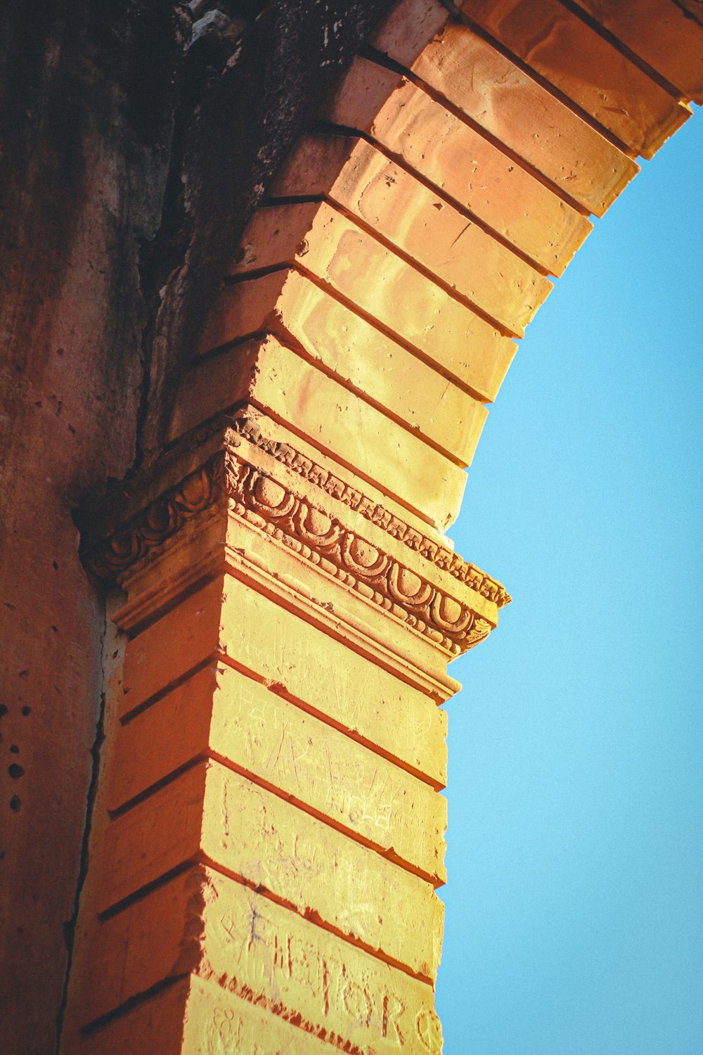 a clock tower with a blue sky in the background