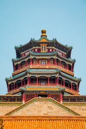 a tall tower with a clock on top of it