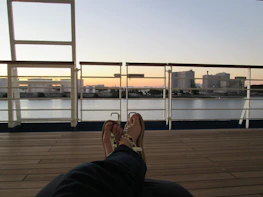 A relaxed business owner enjoying free time, highlighting no risk and no hiring hassle.