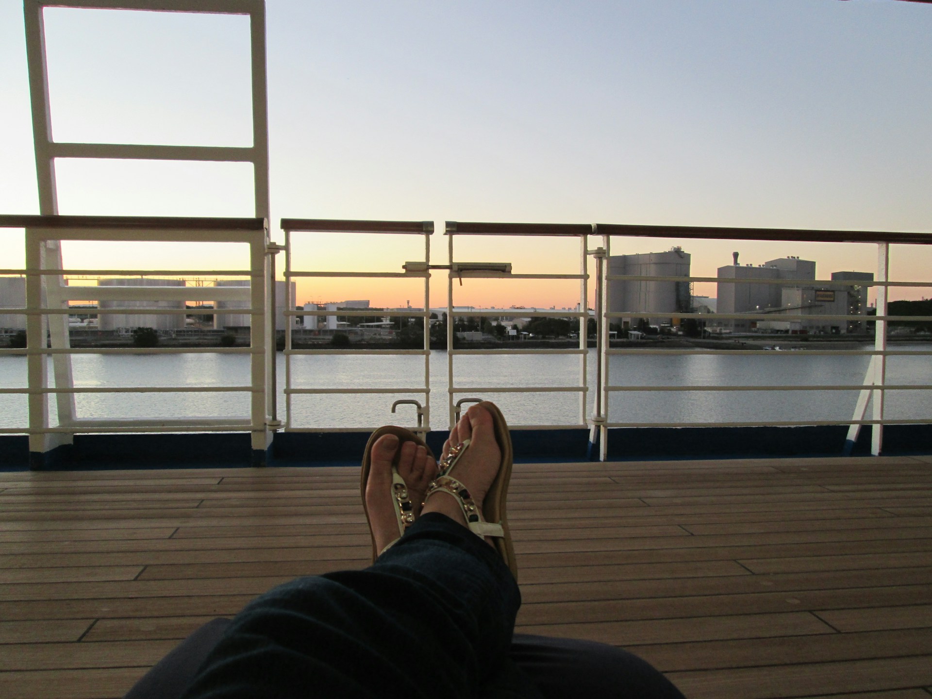 person wearing grey knit sweater