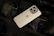 Close-up of a sleek smartphone with a stylish aslihay accessory attached.