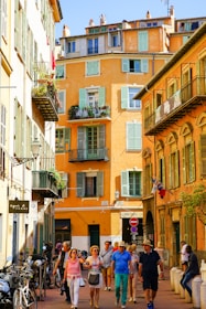 A colorful snapshot capturing a lively street scene in Algeria with people sharing stories.