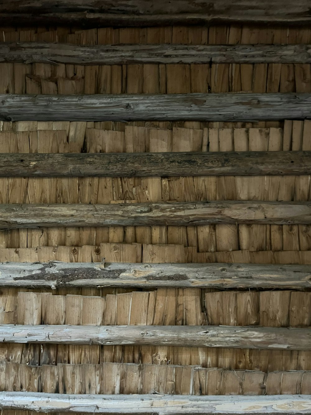 a close up of a wall made of wood planks