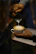 Close-up of a barista carefully pouring latte art on a freshly brewed cup of Chiapas coffee.