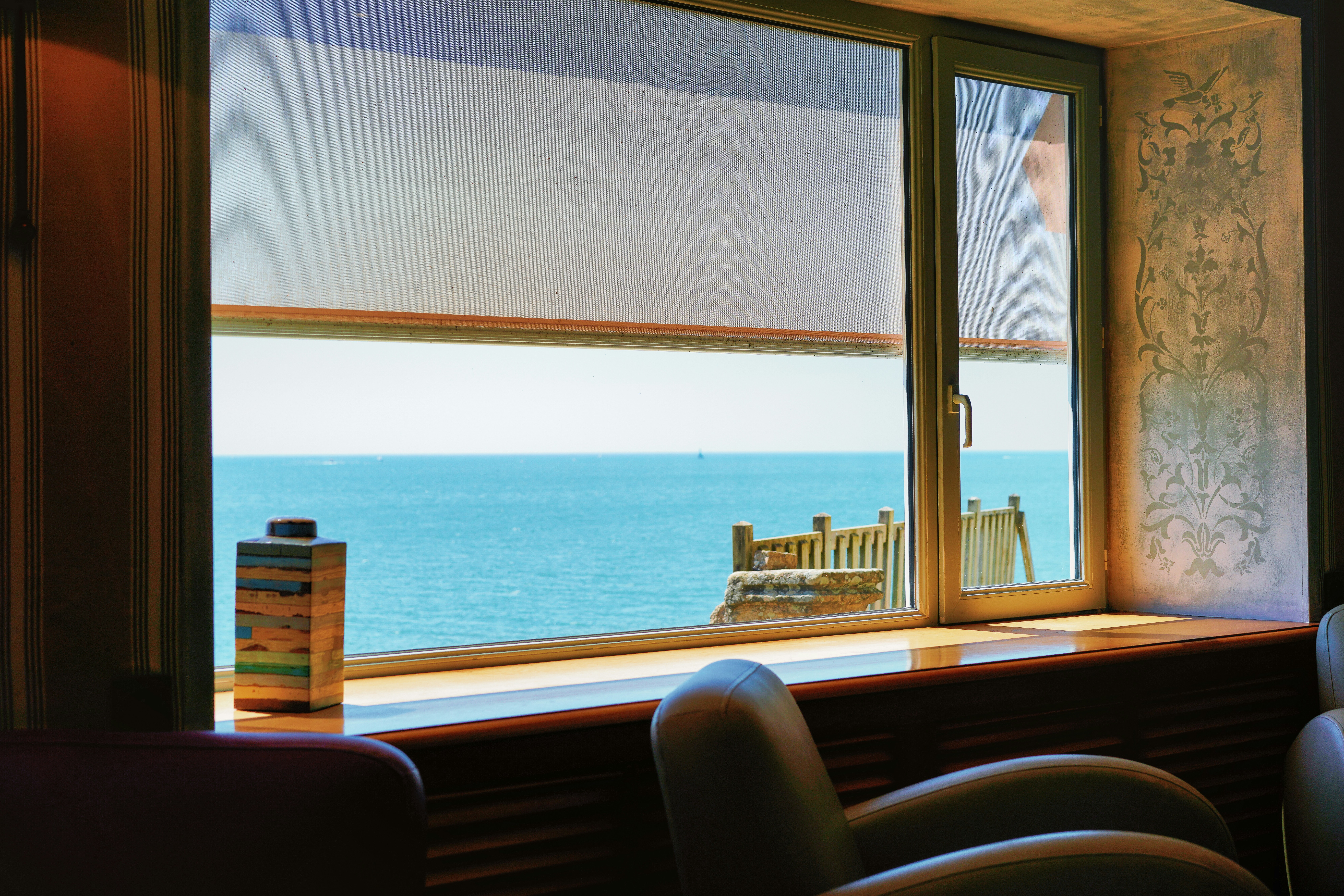 a room with a view of the ocean