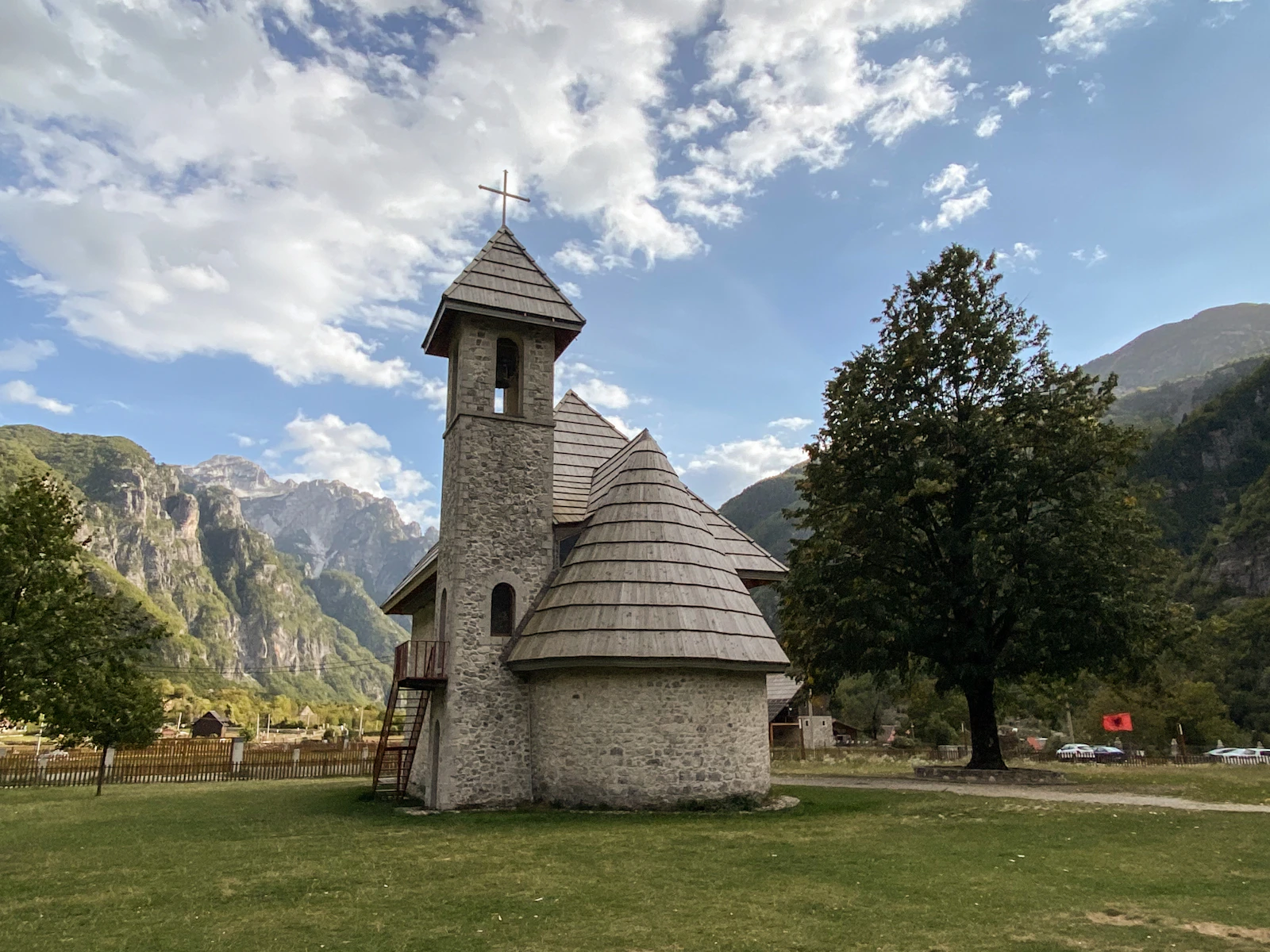 The Church of Theth surrounded by the Albanian Alps