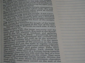 Close-up of a detailed technical report with photos and metric calculations.