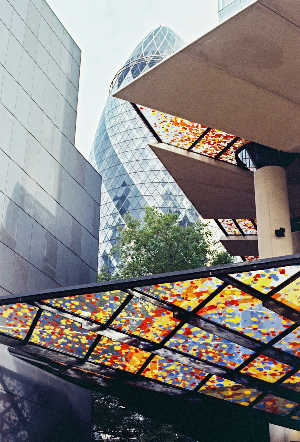 a very tall building with a very colorful glass window