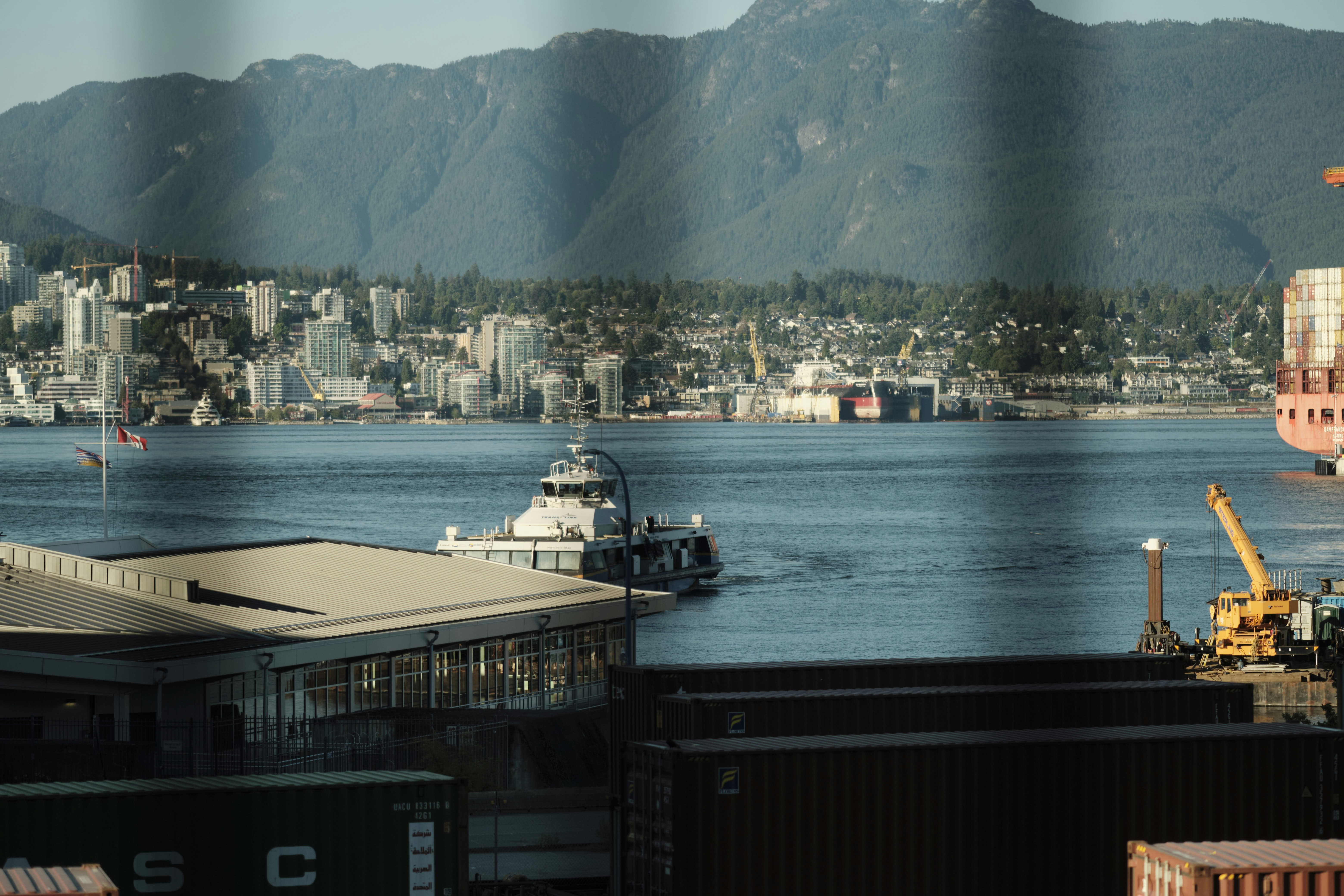 a view of a large body of water with a city in the background