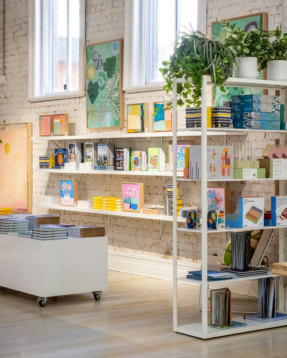 a room filled with lots of books on shelves