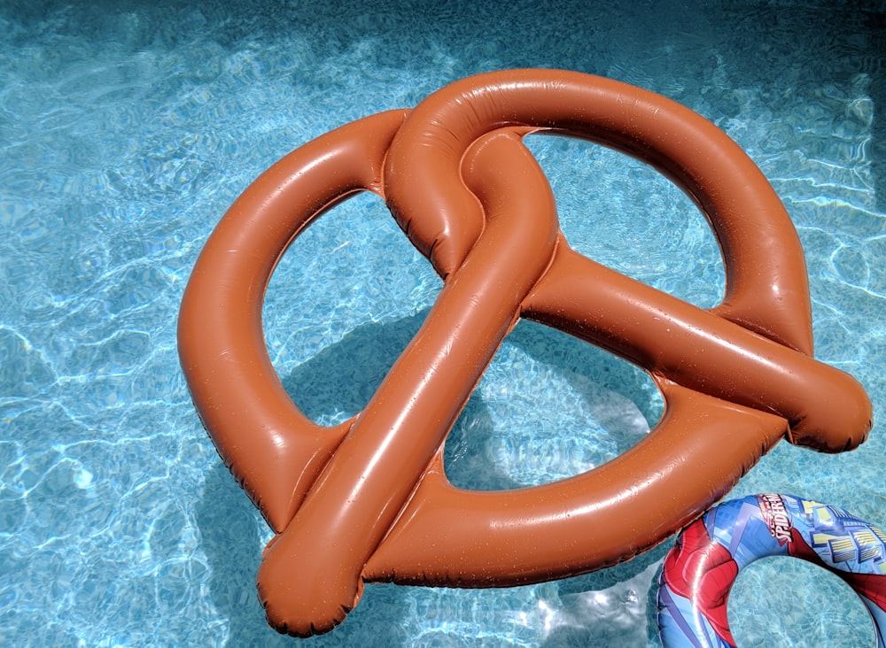 an inflatable object floating in a pool of water