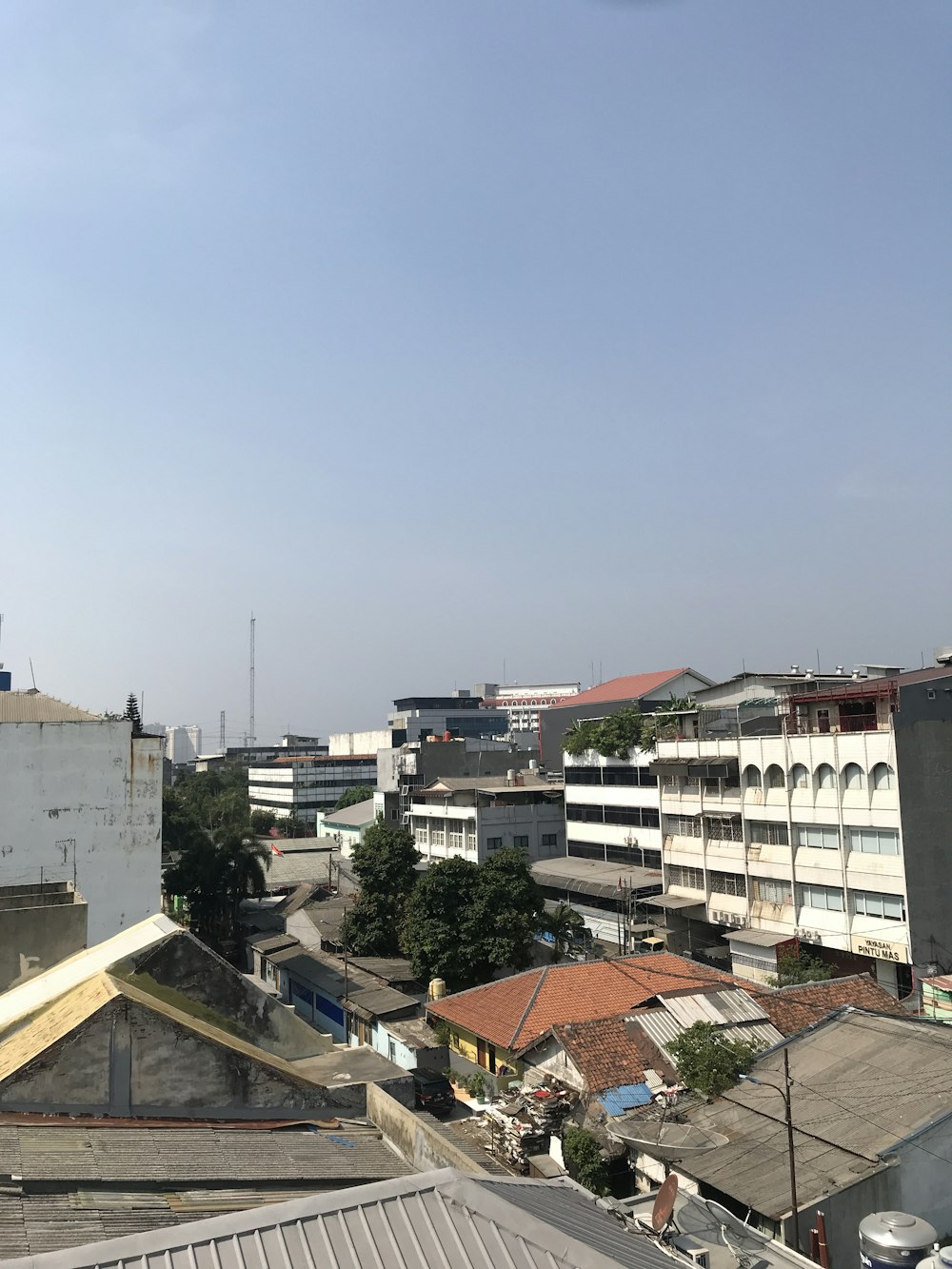 a view of a city from a rooftop