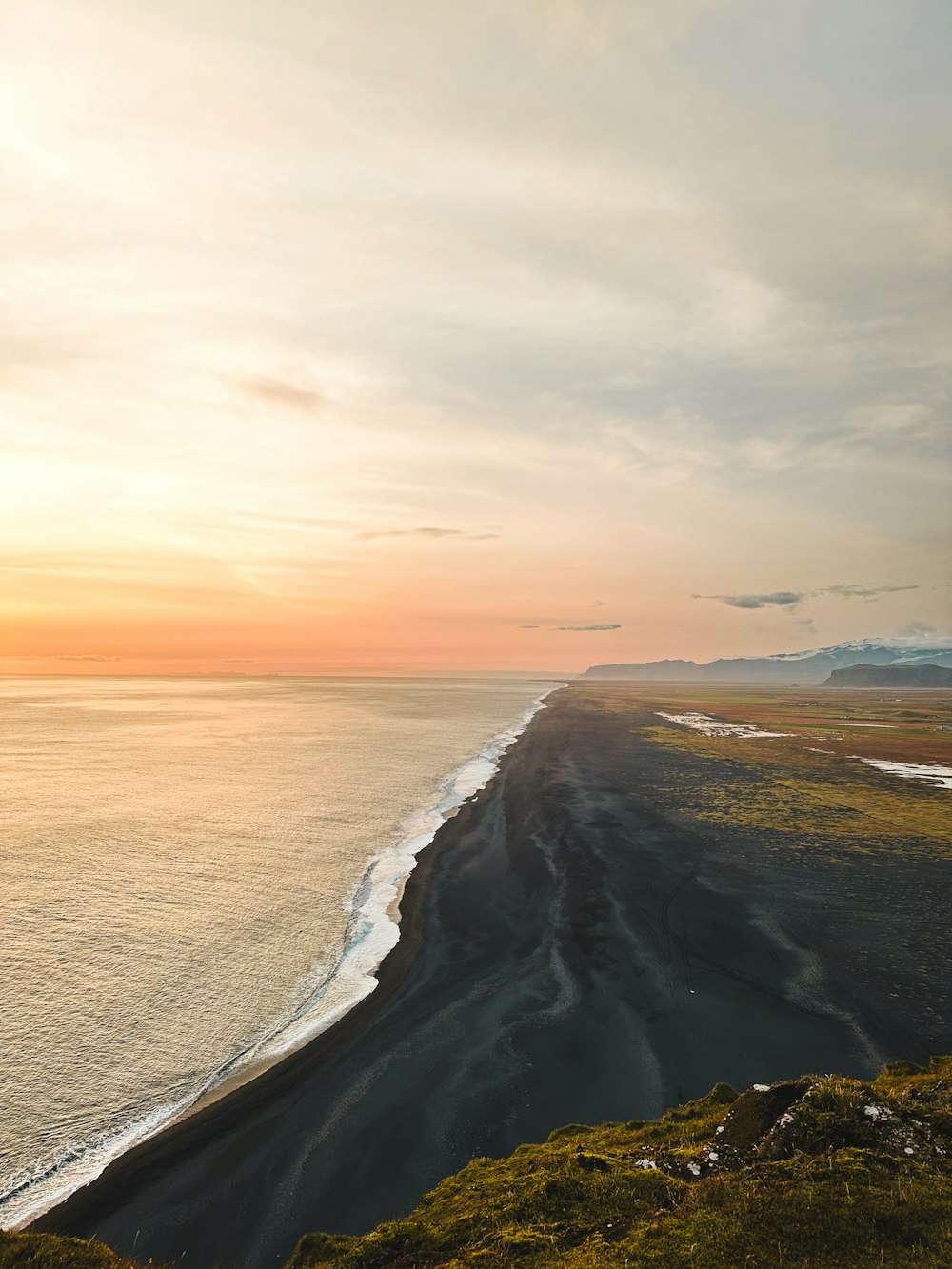 a view of the ocean from a hill