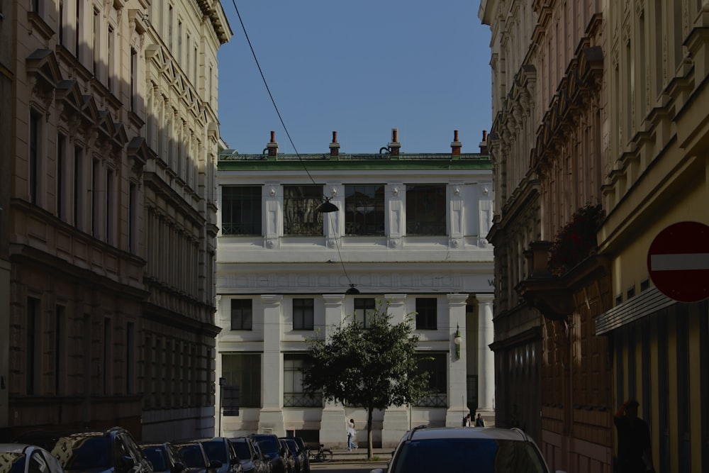 a street with cars parked on both sides of it