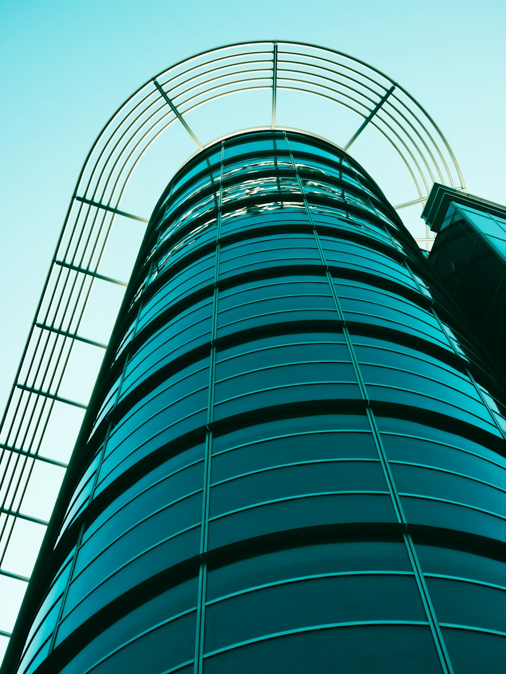 a very tall building with a sky in the background