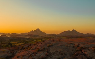 A serene landscape of the Sierras de Córdoba at sunset.