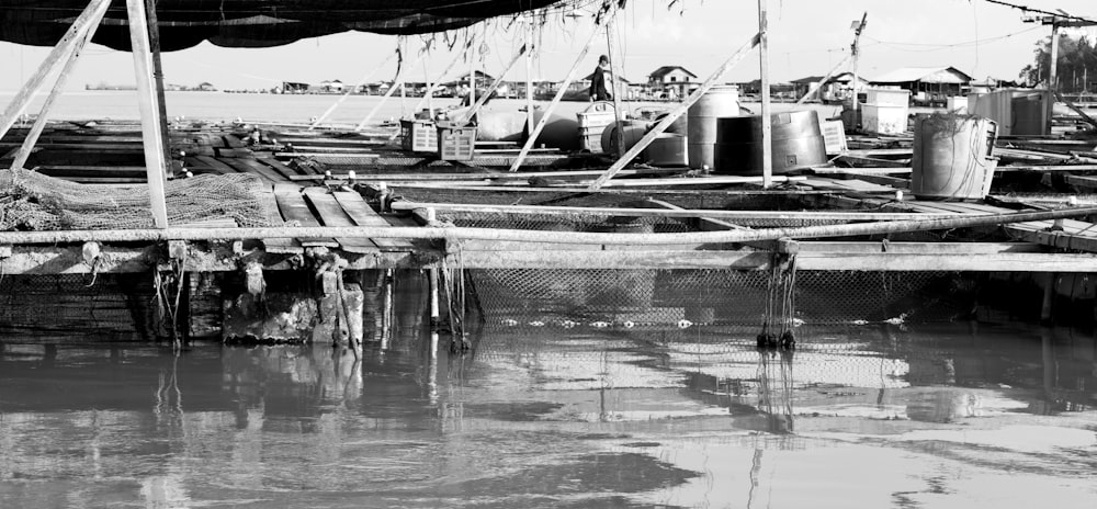 a black and white photo of a dock