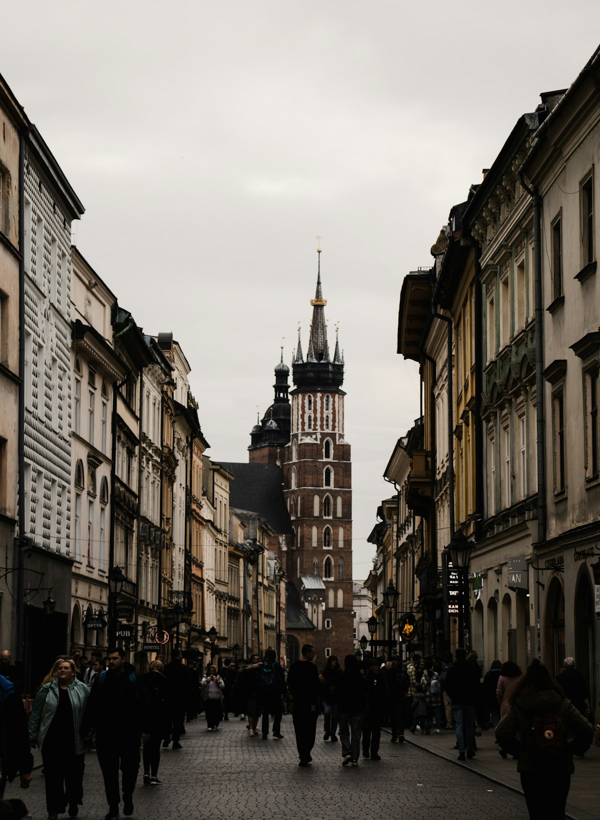 Kraków March — Floriańska Street with St Florian's Gate as spring returns to the Old Town