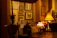 Cozy Parisian apartment interior with warm lighting and stylish decor.
