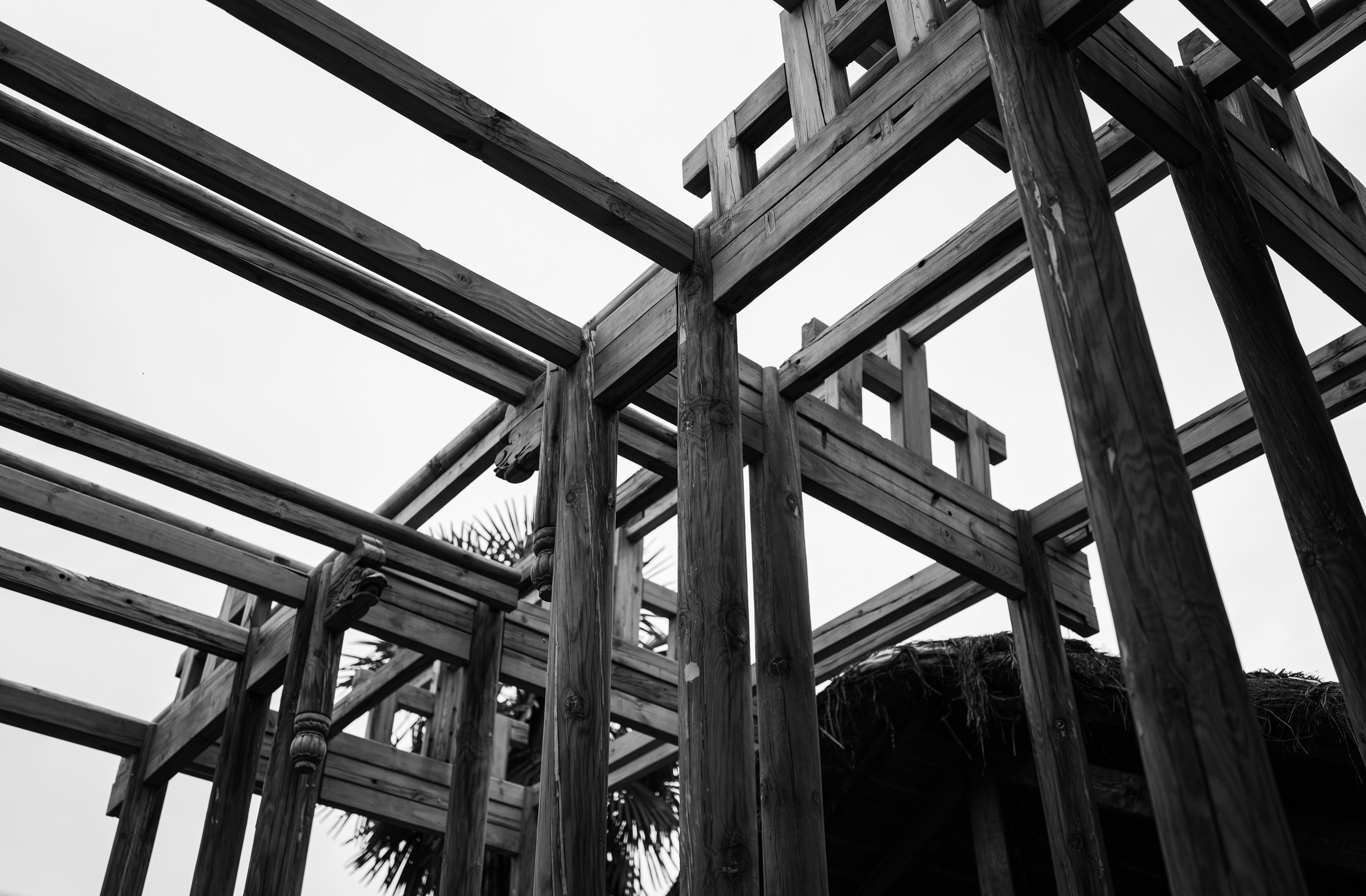 A black and white photo of a wooden structure photo Free Erhai lake