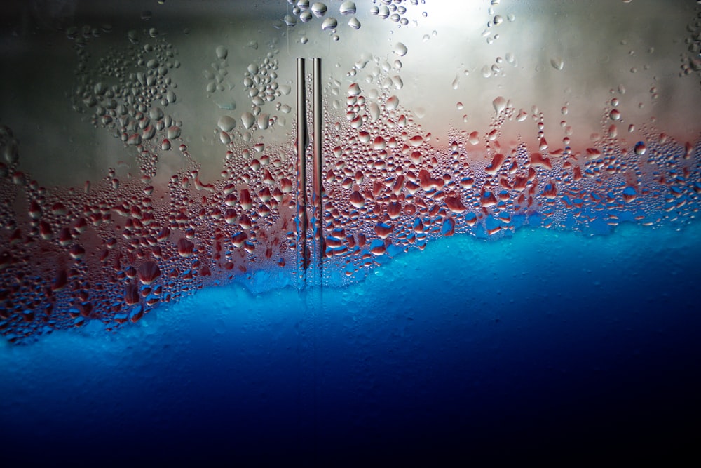 a close up of water droplets on a window