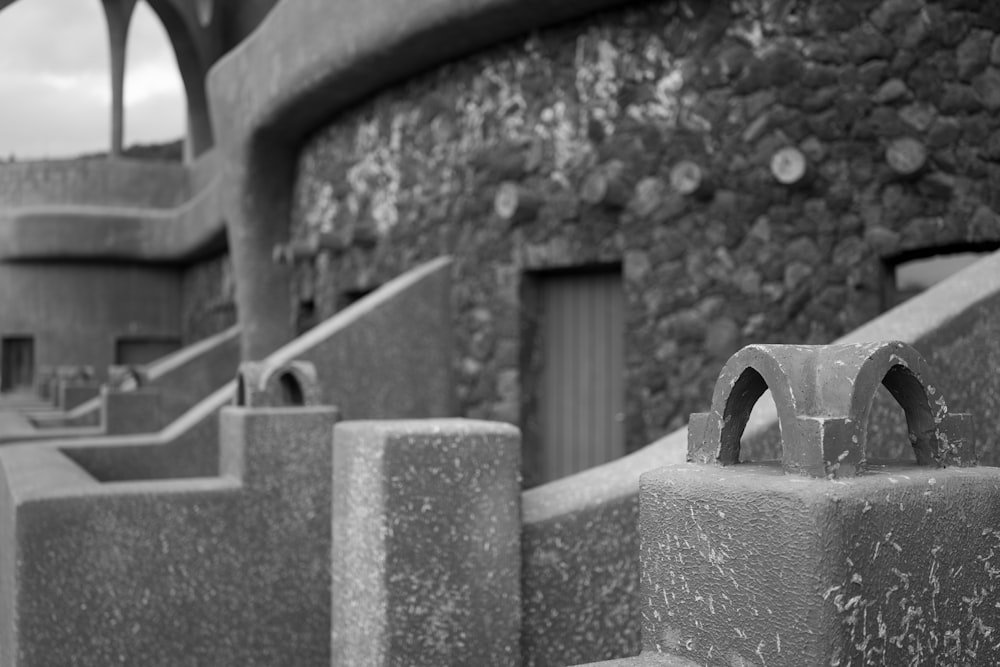 a black and white photo of a stone building