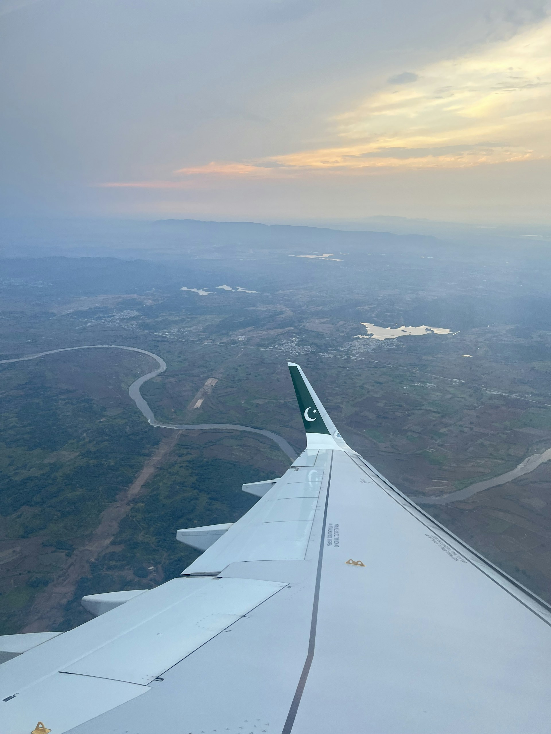 woman wearing yellow long-sleeved dress under white clouds and blue sky during daytime