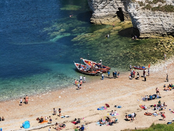 A vibrant beach scene showcasing a marketing team brainstorming.