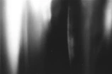 Minimalist black and white cover featuring soft blur and smooth fade textures.