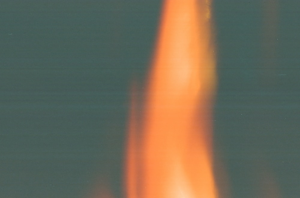 a close up of a fire with a blurry background