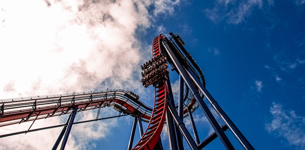 a roller coaster with a sky background