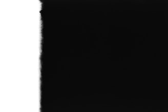 A predominantly black image with a small vertical strip of white on the left edge, suggesting a possible exposure or processing issue.