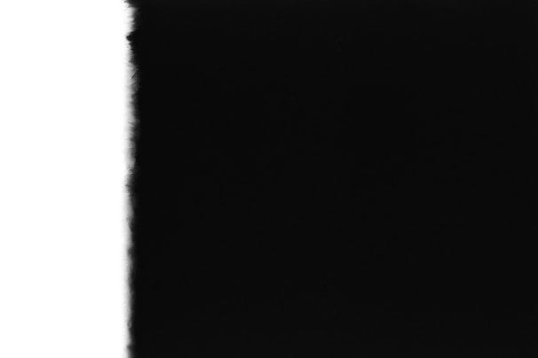 A predominantly black image with a small vertical strip of white on the left edge, suggesting a possible exposure or processing issue.