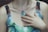 a close up of a person wearing a necklace
